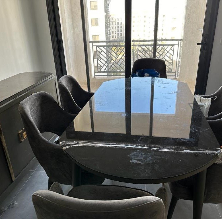Dining area with balcony view, apartment for rent in Celia Compound, New Administrative Capital