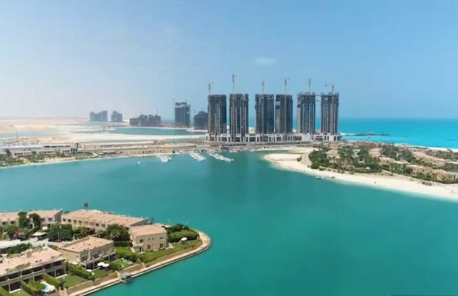 إطلالة جوية على اللاجون والشاطئ والأبراج - شاليه في علم الروم العلمين الجديدة