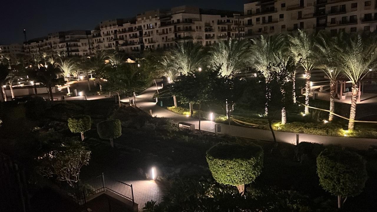 Furnished apartment for rent in Eastown SODIC New Cairo, compound gardens night view - شقة مفروشة للإيجار في إيستاون التجمع الخامس، إطلالة ليلية على حدائق الكمبوند 114-10