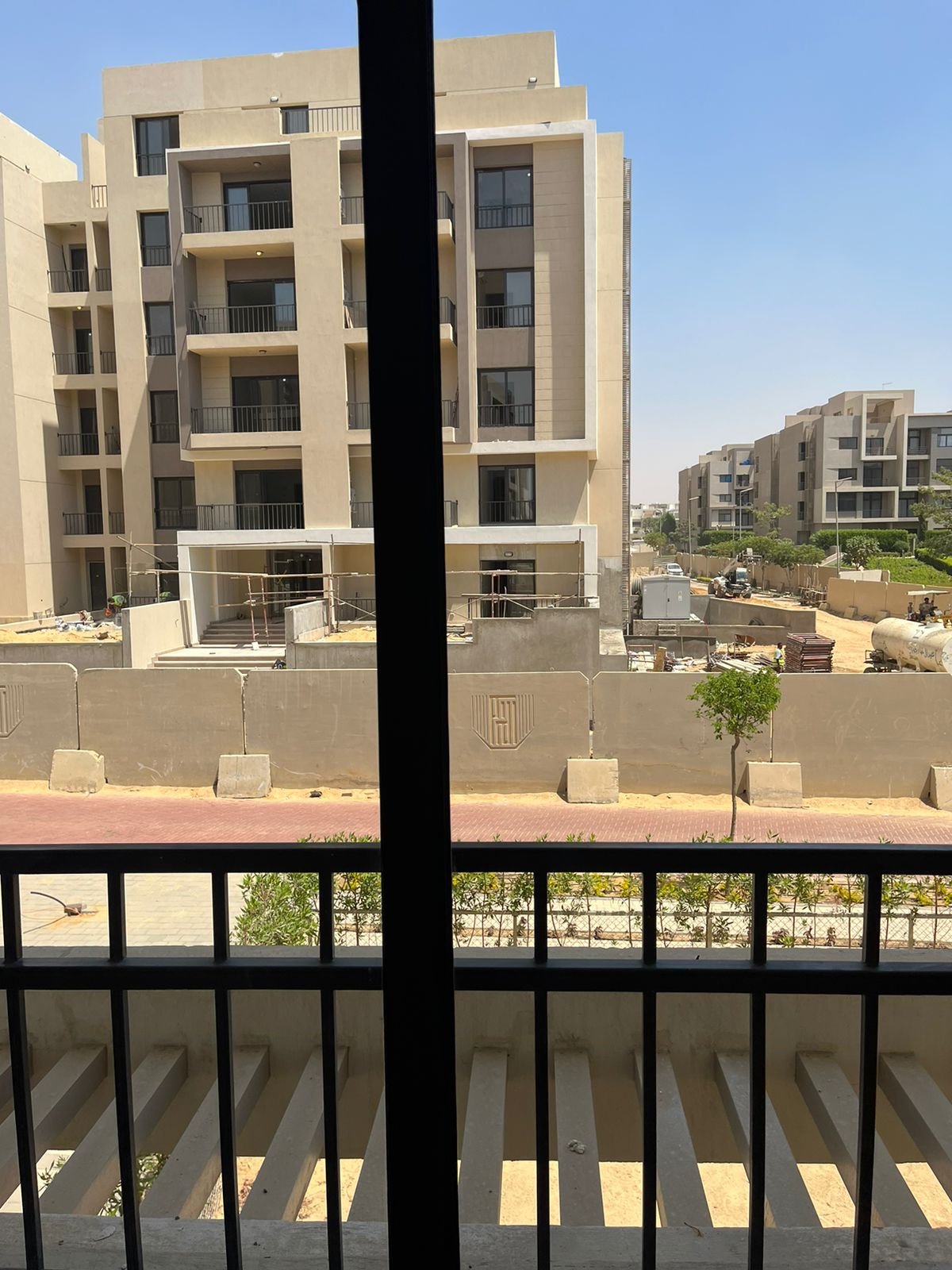 Balcony railing and compound view - apartment in Fifth Square, New Cairo