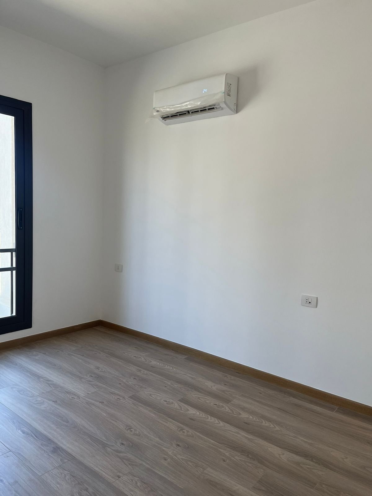 Empty room with air conditioner - apartment in Fifth Square, New Cairo