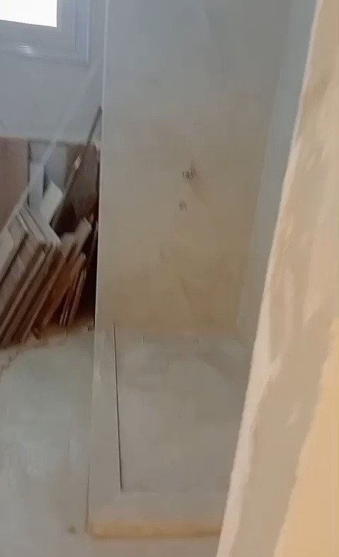 Marble-tiled shower with a glass panel - apartment in Mountain View iCity, New Cairo