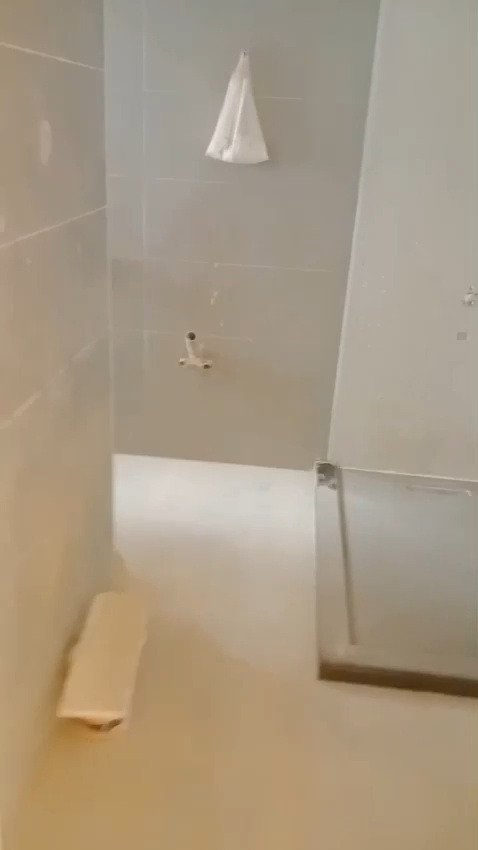 Shower floor with a glass screen and a niche - apartment in Mountain View iCity, New Cairo