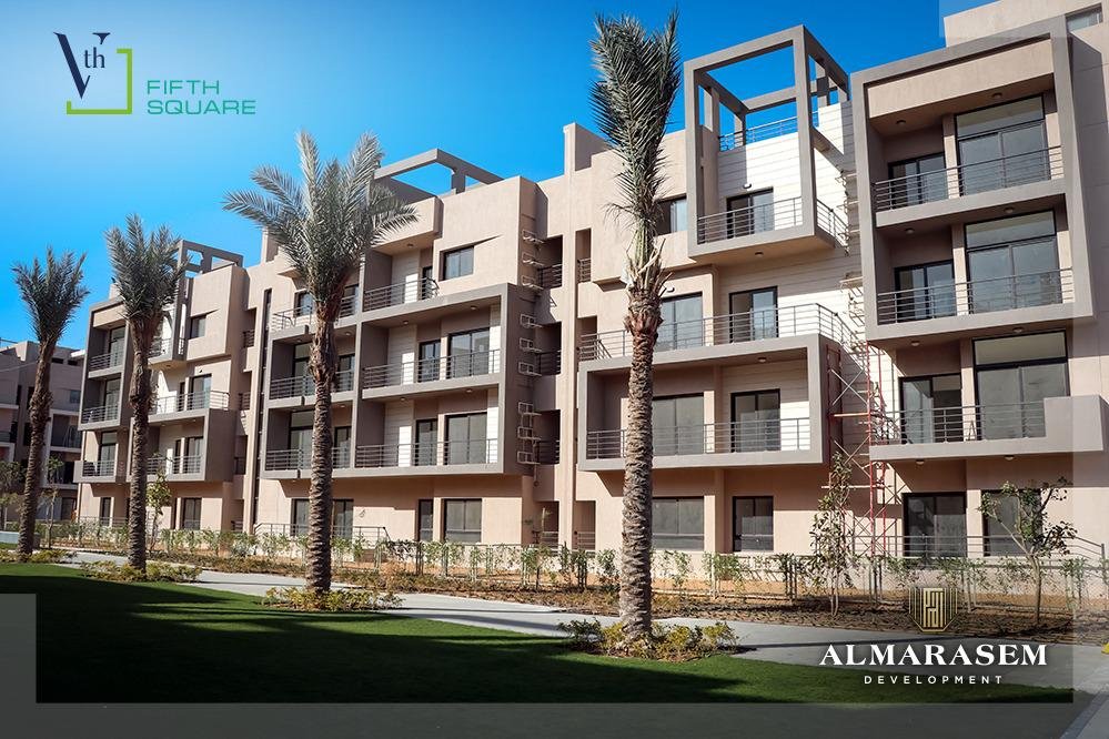Palm trees and apartment buildings - apartment in Fifth Square, New Cairo