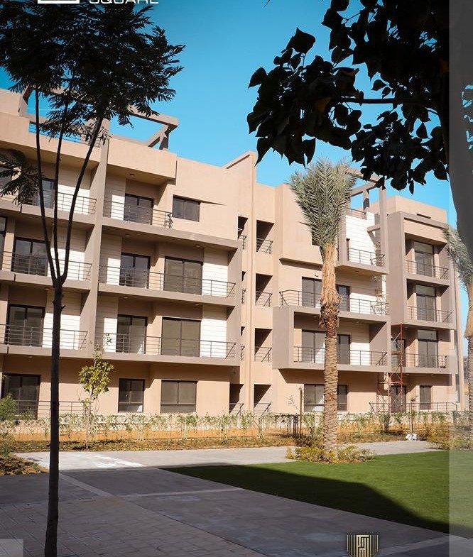 Apartment buildings and garden path - apartment in Fifth Square, New Cairo
