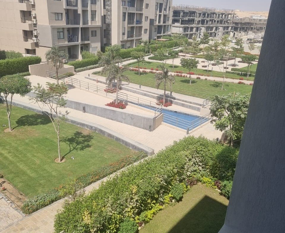 Garden and pool seen from the balcony - apartment in Fifth Square, New Cairo