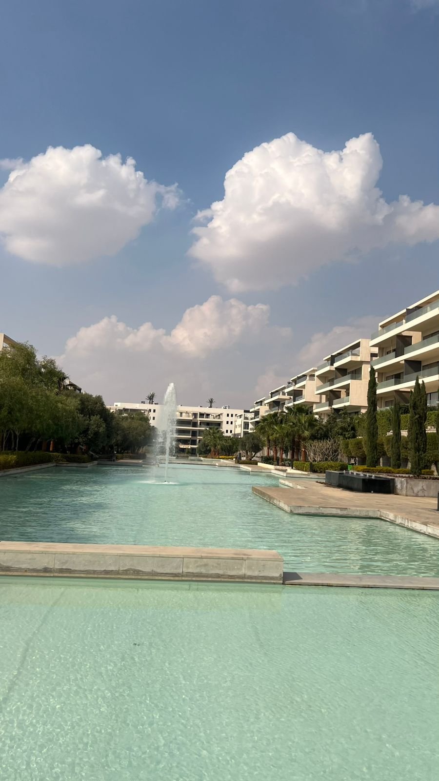 furnished-ground-floor-apartment-for-rent-lake-view-residence-new-cairo-191-sqm-pool مجرى مائي في الكمبوند تحت سماء بها غيوم - شقة في ليك فيو ريزيدنس، القاهرة الجديدة