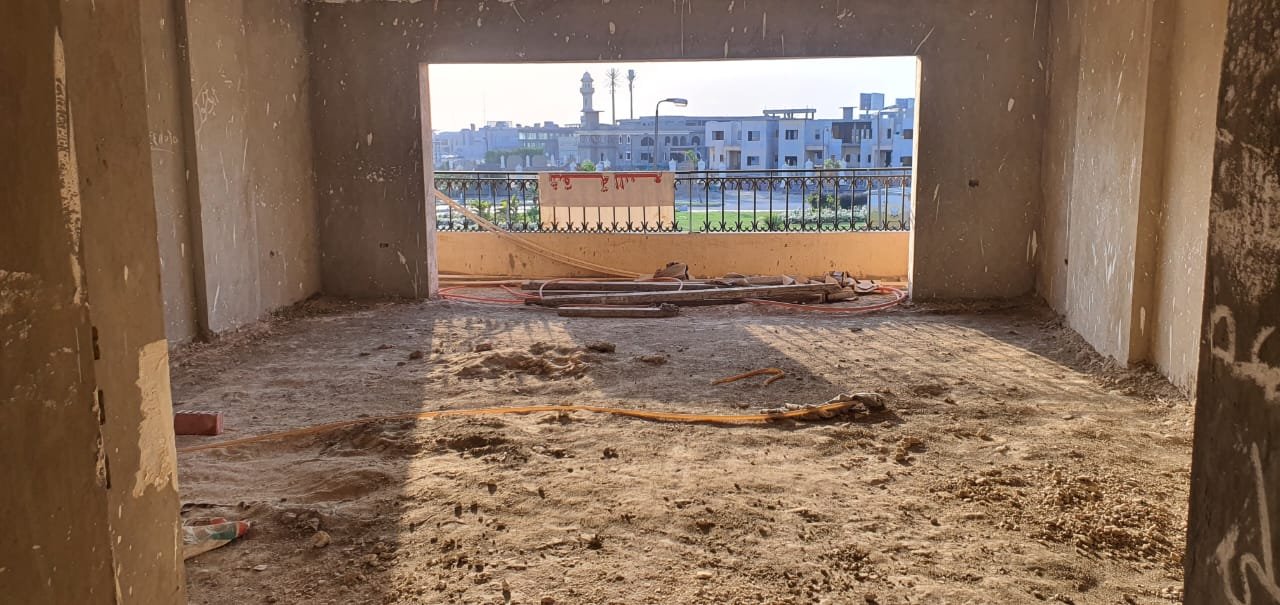 gharb-golf-apt-260-03 Unfinished room with a wide window opening and a sandy floor - apartment in Gharb Golf 5th Settlement