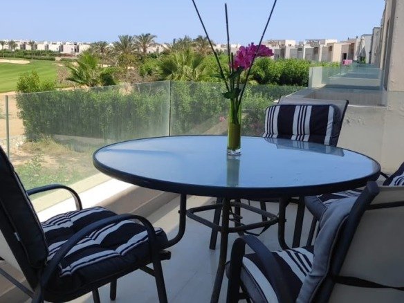 Villa for sale in Hacienda Bay North Coast - terrace with golf and lagoon view