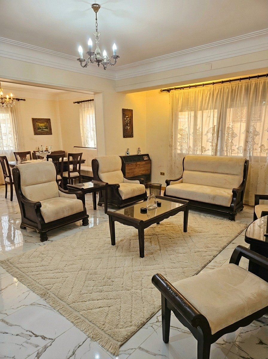 heliopolis-apt-196-3 ريسبشن مع كنب وكراسي بذراعين وطاولة سفرة - شقة في مصر الجديدة