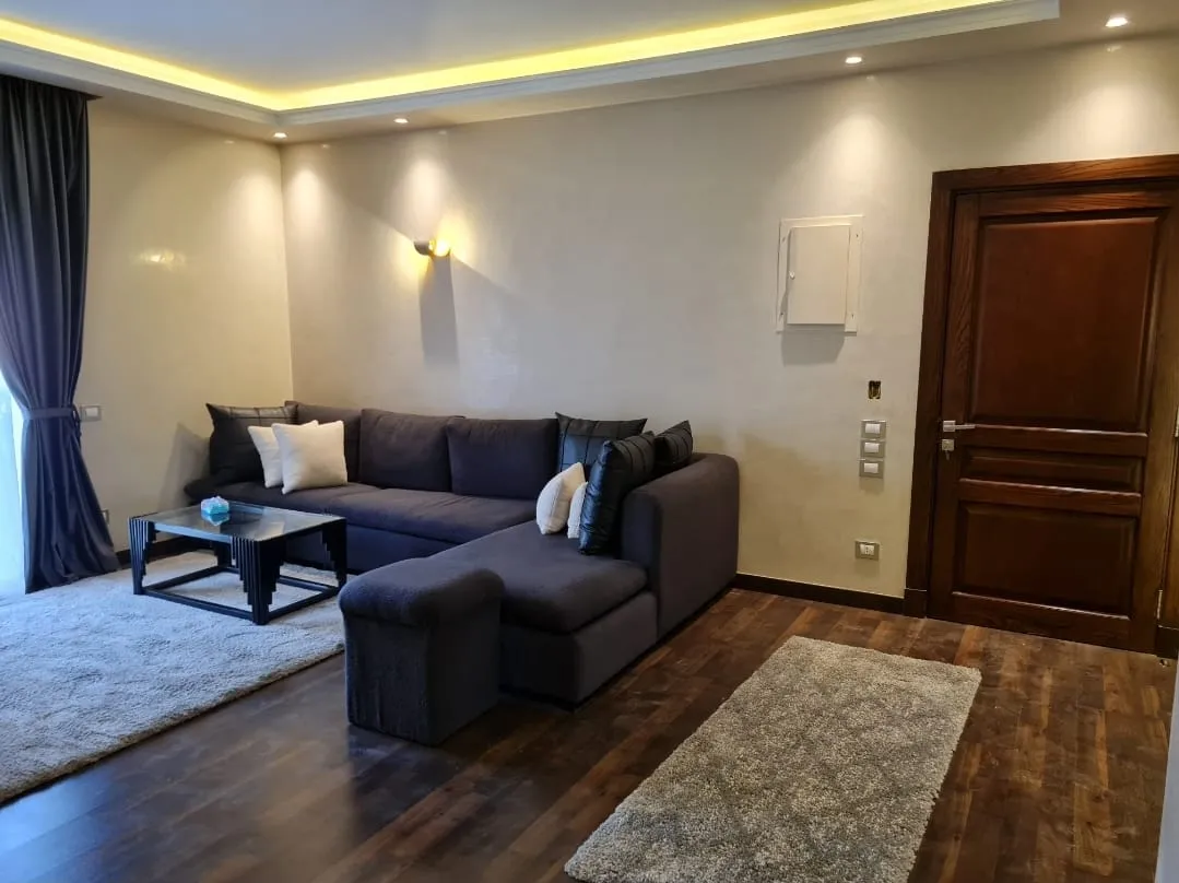 Corner sofa and coffee table - studio in Hyde Park, New Cairo