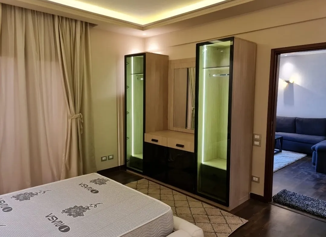 Bedroom wardrobe and dressing area - studio in Hyde Park, New Cairo