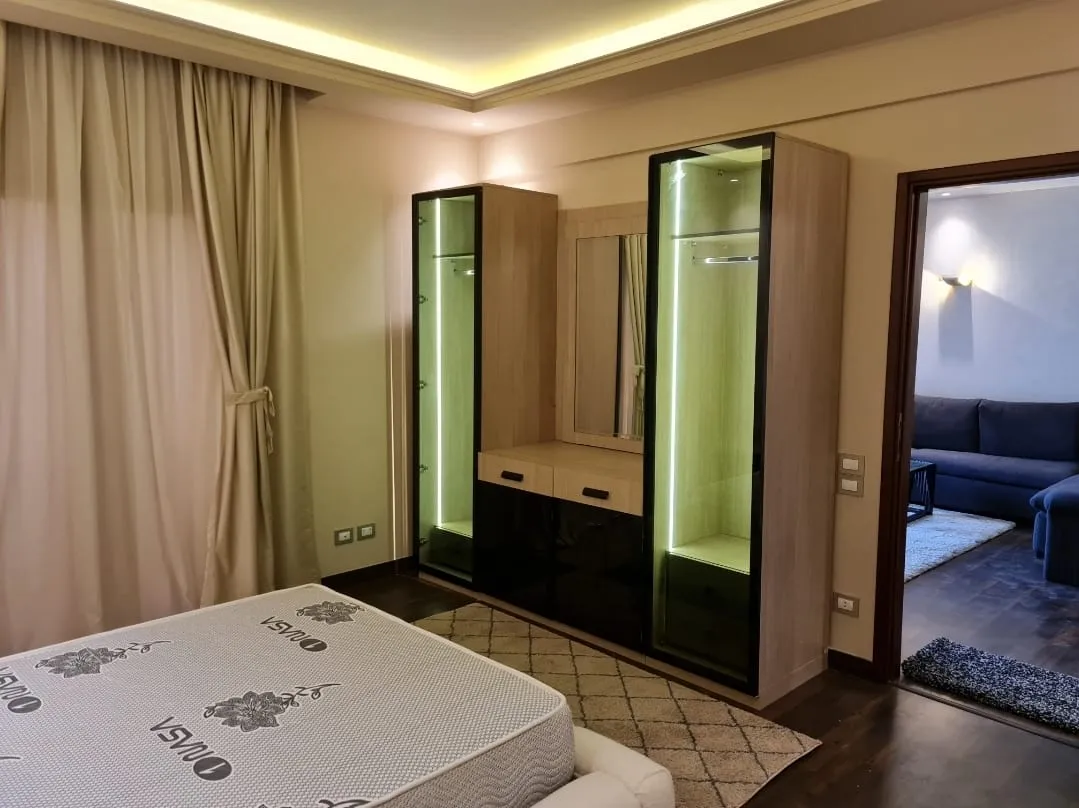 Bedroom wardrobe and dressing area - studio in Hyde Park, New Cairo