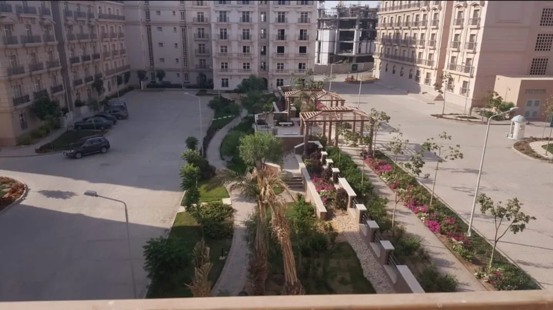 Compound courtyard and gardens from the balcony - studio in Hyde Park, New Cairo