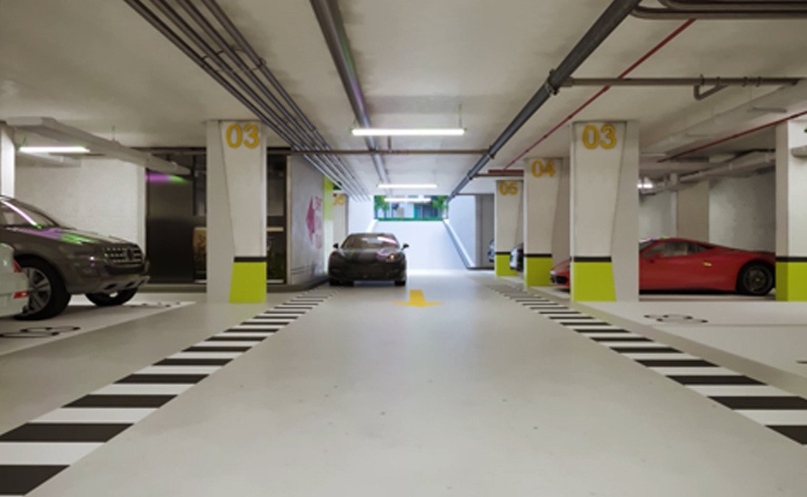 Underground parking aisle with painted columns and parked cars - apartment in The Icon Gardens, 5th Settlement