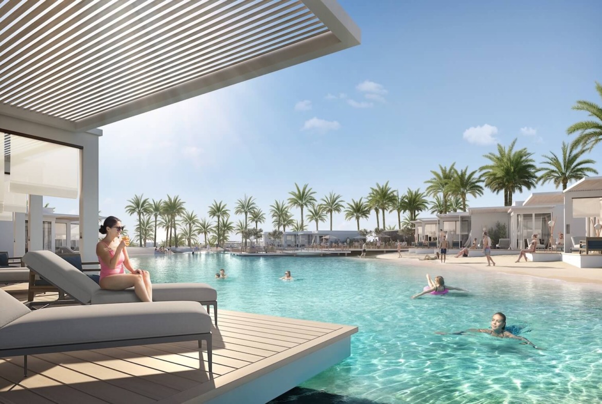 Pool deck with lounger under a louvered pergola - hotel apartment in Soul by Emaar, North Coast