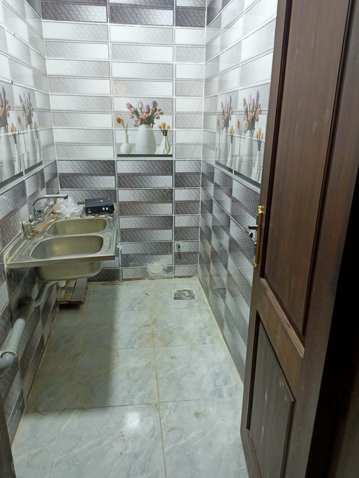 lotus-south-apt-223-ph10 Service room with a sink and tiled wall - apartment in South Lotus on South 90th Street, New Cairo