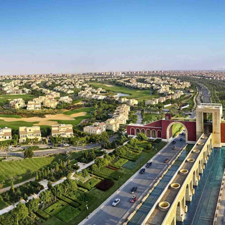 Madinaty aerial view of the gate and golf course, general photo - صورة جوية لبوابة مدينتي وملعب الجولف صورة عامة - apartment for sale in Madinaty