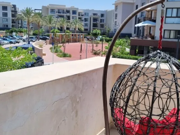 Terrace with hanging chair, chalet for rent in Marassi Marina 1 - تراس بكرسي معلق، شاليه للإيجار في مارينا مراسي 1