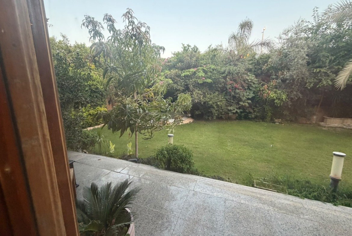 Reception with garden view, villa for sale in Maxim Country Club - ريسبشن بإطلالة على الجاردن، فيلا للبيع في كمبوند مكسيم