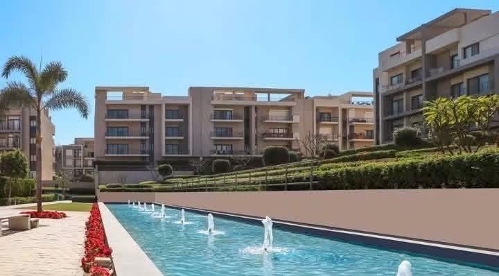 مسبح بنافورات ومباني شقق - شقة في مون ريزيدنس فيفث سكوير، القاهرة الجديدة