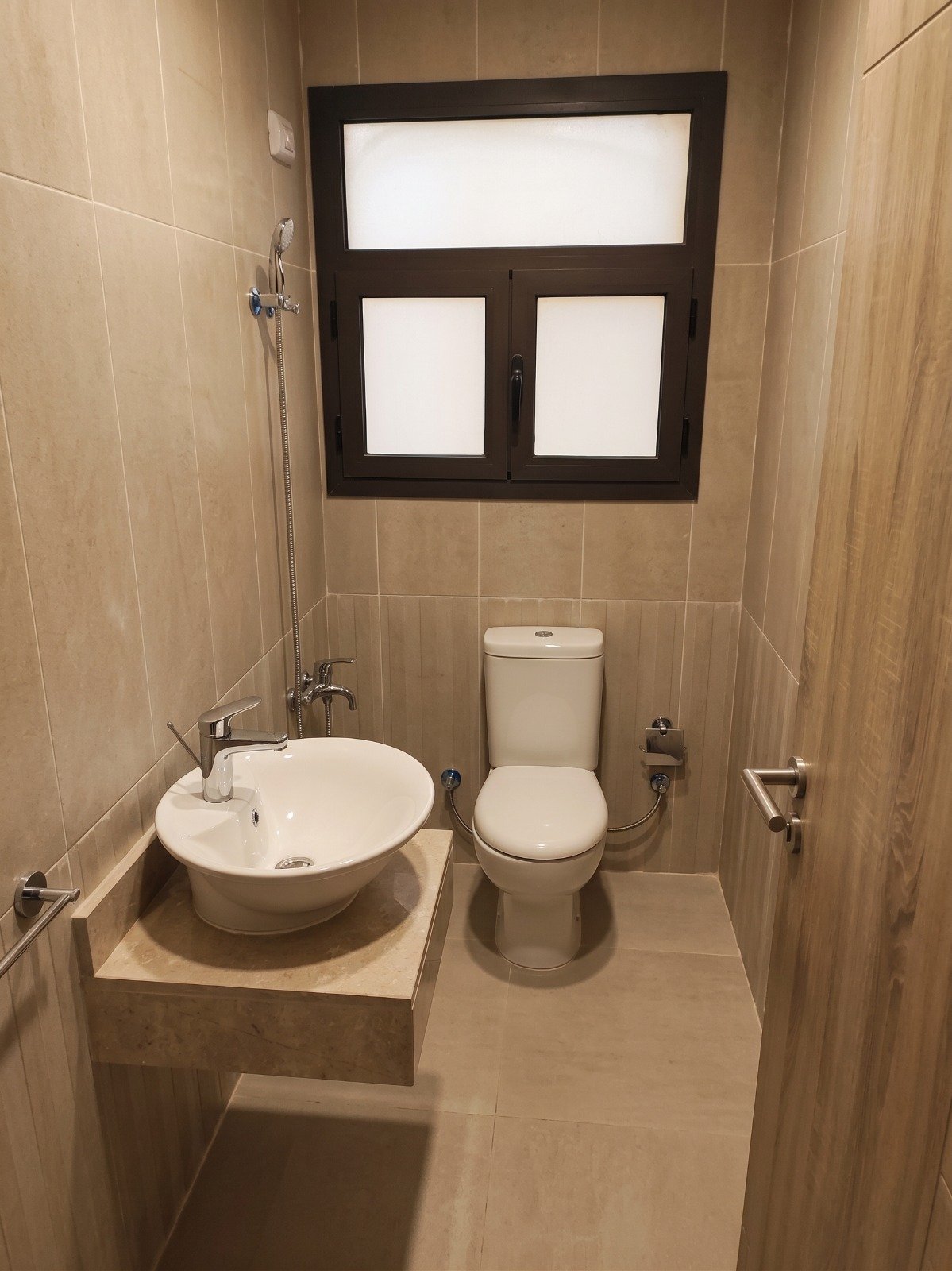moon-residences-5th-square-bathroom-1 Bathroom with round washbasin and toilet - apartment in Moon Residence, Fifth Square, New Cairo