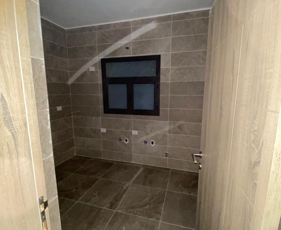 Empty bathroom with window - apartment in Moon Residence, Fifth Square, New Cairo