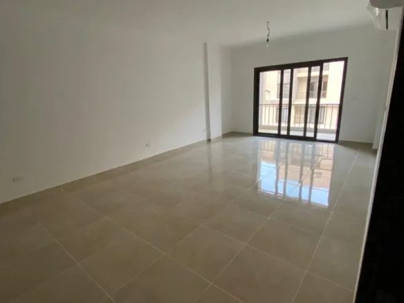 Spacious reception with balcony window and AC in apartment for rent in Moon Residences 5th Square