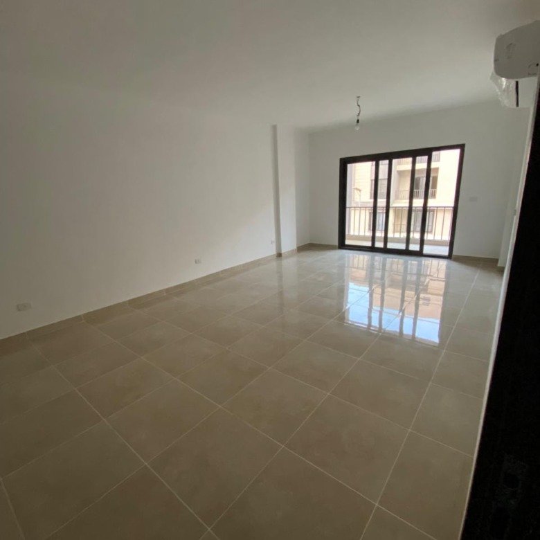 Spacious reception with balcony window and AC in apartment for rent in Moon Residences 5th Square