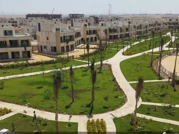 Noor City villa zone with landscaped gardens, New Capital - منطقة الفيلات بمدينة نور