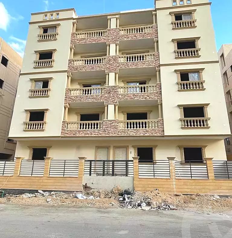 Apartment building facade with balconies under construction - apartment in North Lotus, New Cairo