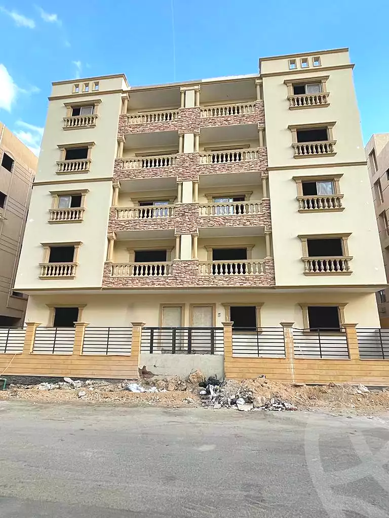 Apartment building facade with balconies under construction - apartment in North Lotus, New Cairo