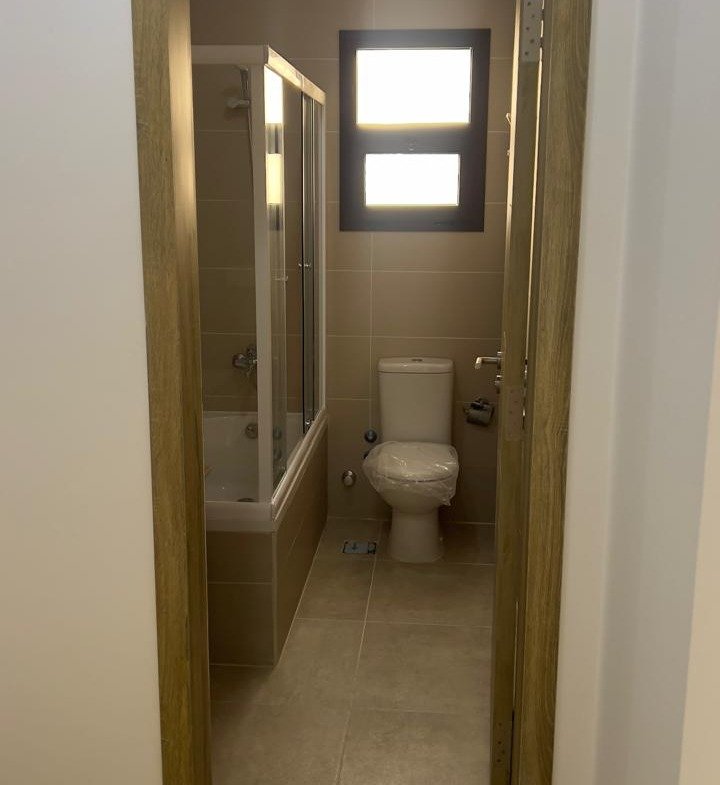 Bathroom seen through the door - penthouse in Fifth Square, New Cairo