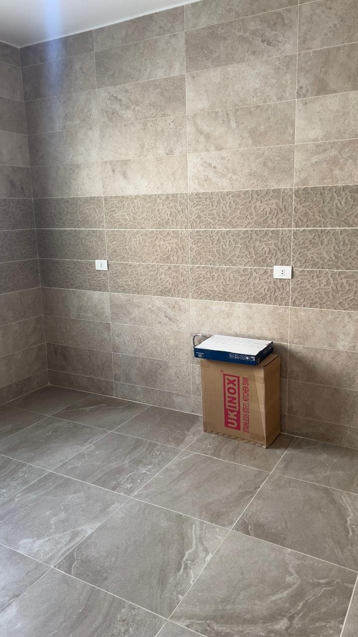 penthouse-sale-fifth-square-new-cairo-28-bathroom-2 Empty kitchen with grey tiles - penthouse in Fifth Square, New Cairo