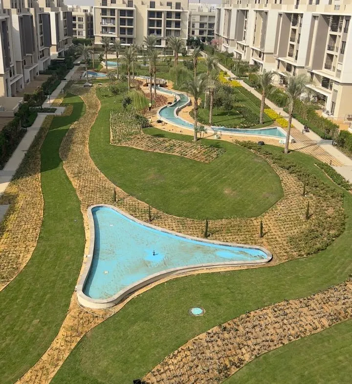 Lagoon pool and gardens seen from above - penthouse in Fifth Square, New Cairo