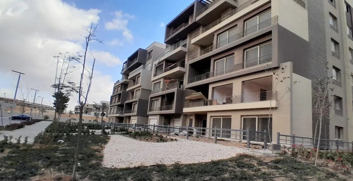 Modern stone-and-grey apartment block with terraces - apartment in Palm Hills, New Cairo