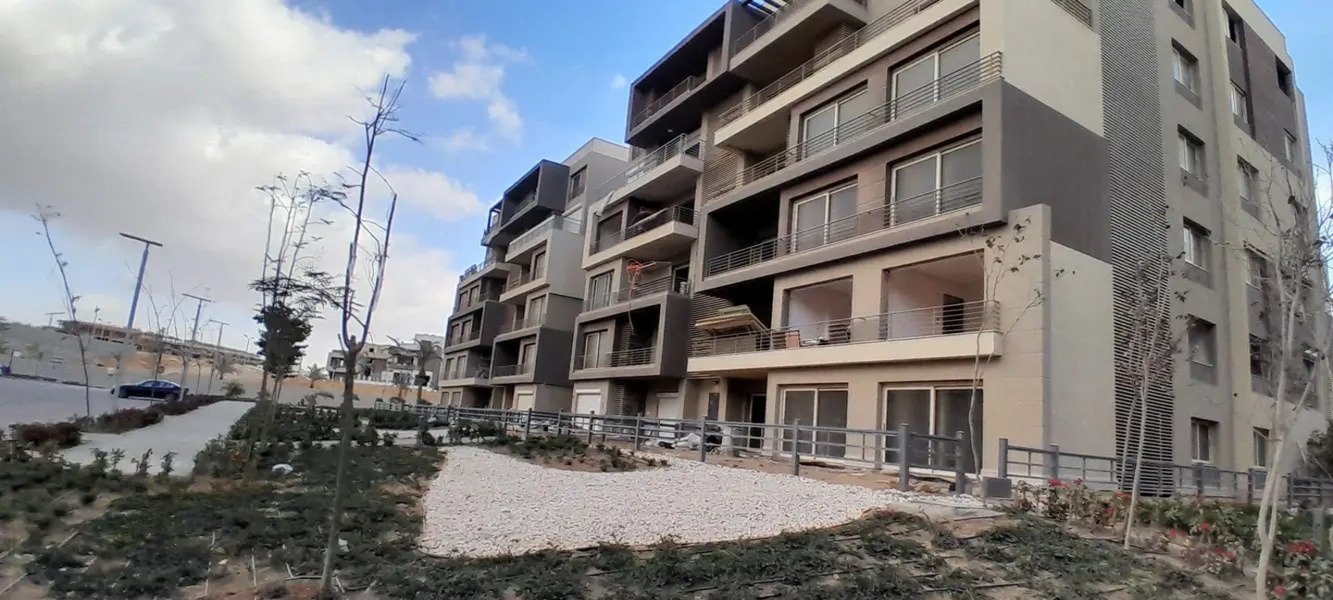 phnc521-i05 Modern stone-and-grey apartment block with terraces - apartment in Palm Hills, New Cairo