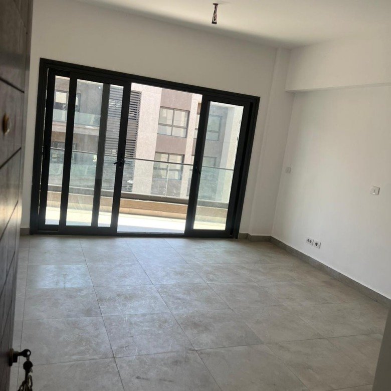 Apartment for sale in Privado Madinaty New Cairo - living room with balcony