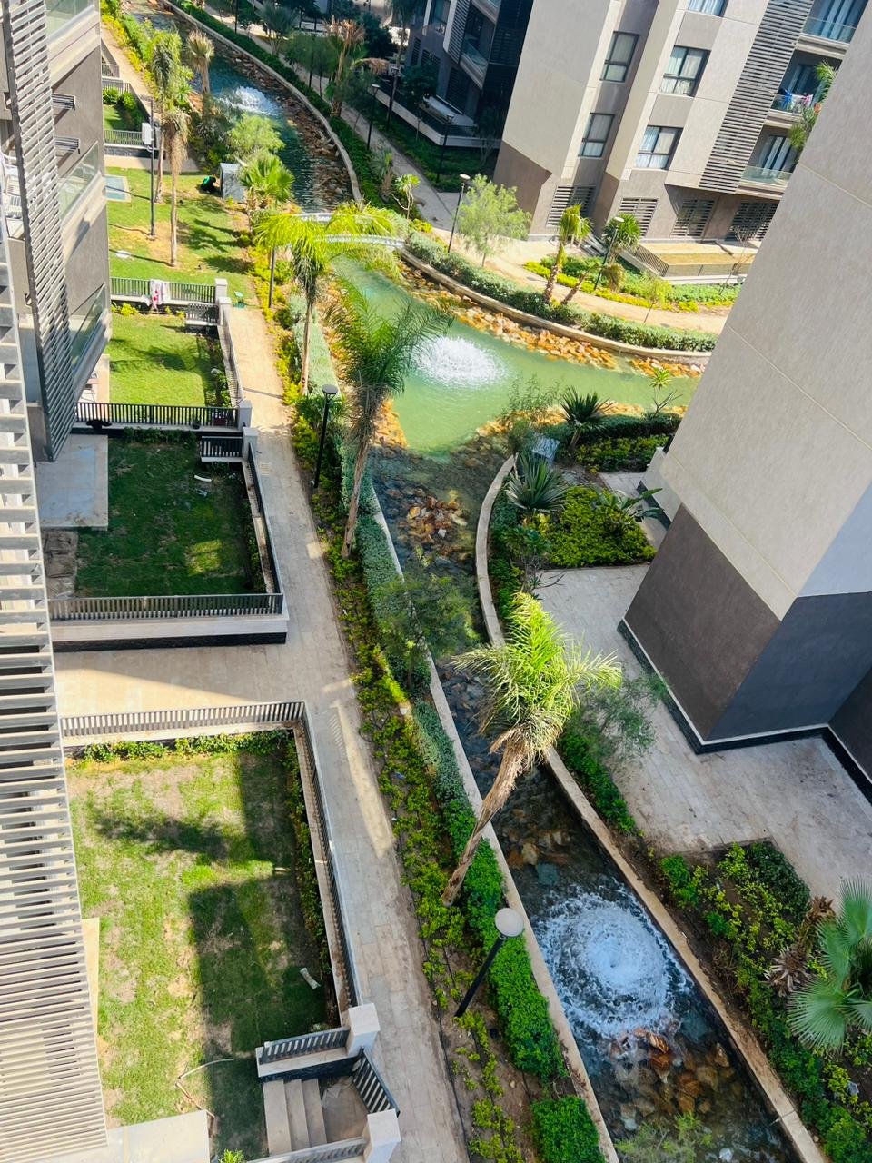Apartment for sale in Privado Madinaty New Cairo - aerial lake and garden view