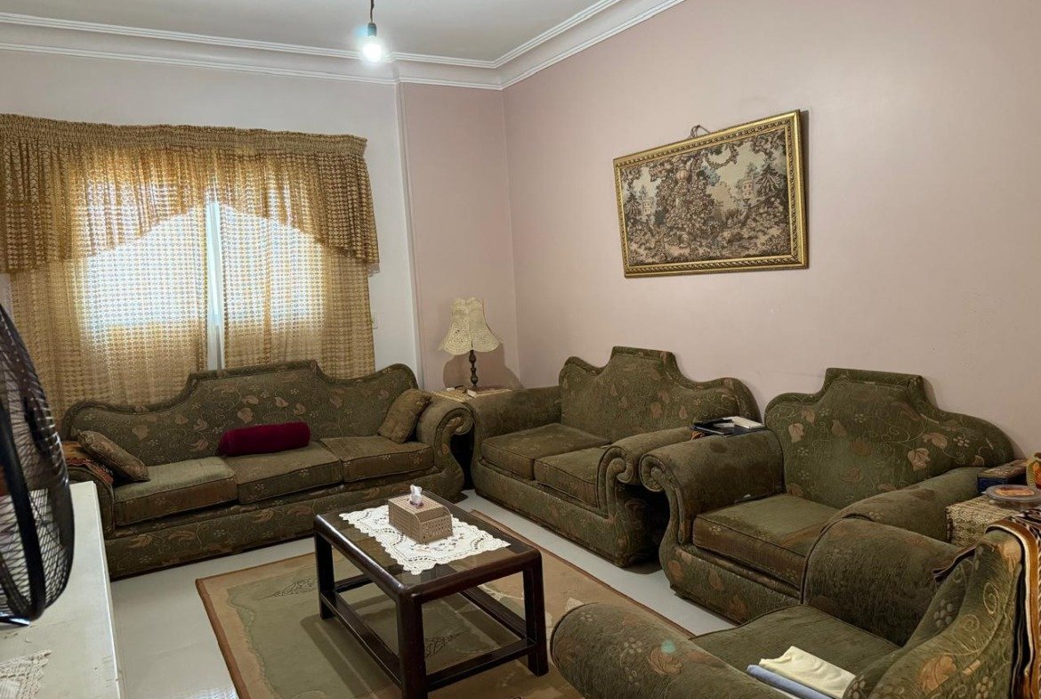 Second seating area with green sofas, roof in Al Banafseg New Cairo - ركنة جلوس ثانية بأنتريه أخضر، روف في البنفسج القاهرة الجديدة