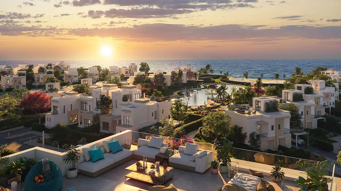 Rendering of white villas at sunset with sea beyond - chalet in Seashore, North Coast