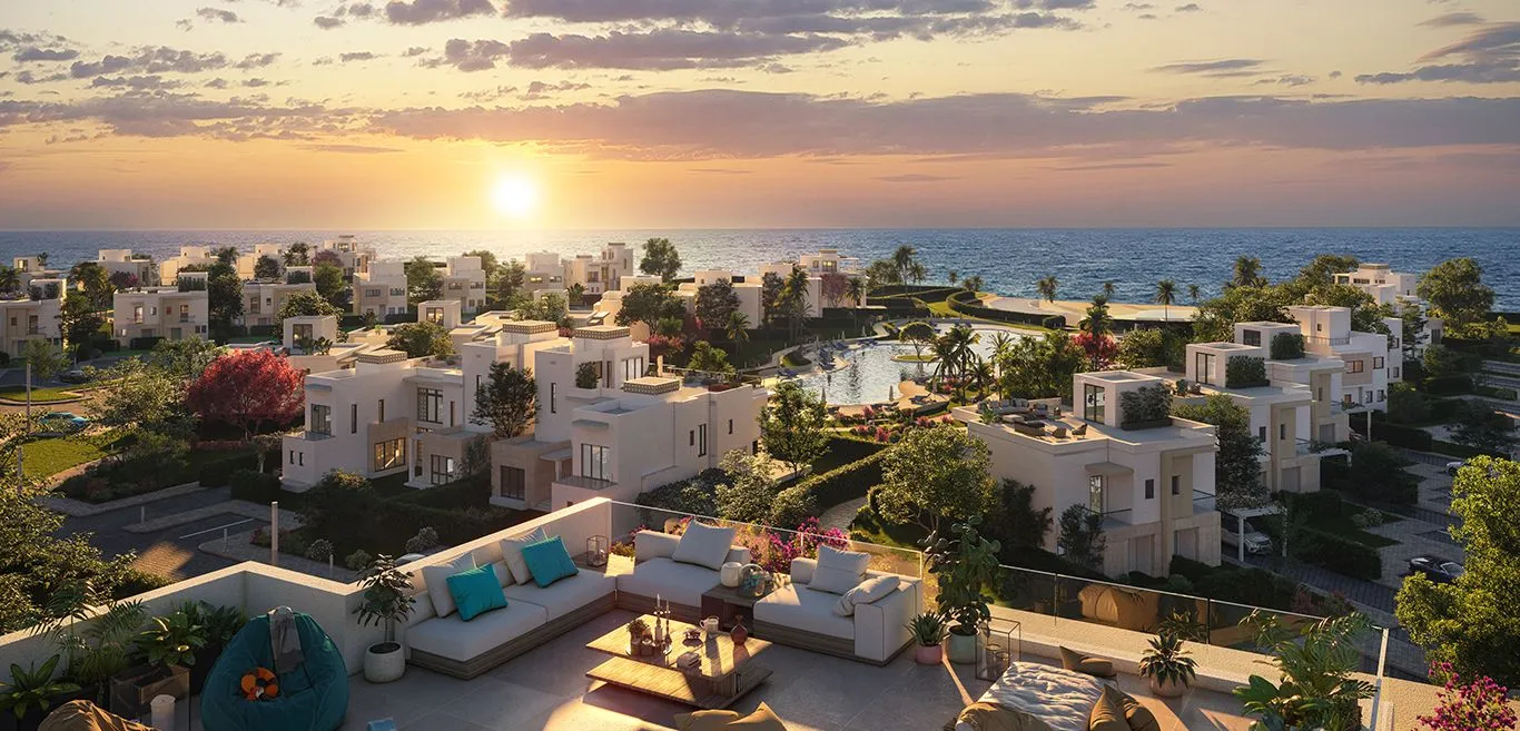 Rendering of white villas at sunset with sea beyond - chalet in Seashore, North Coast