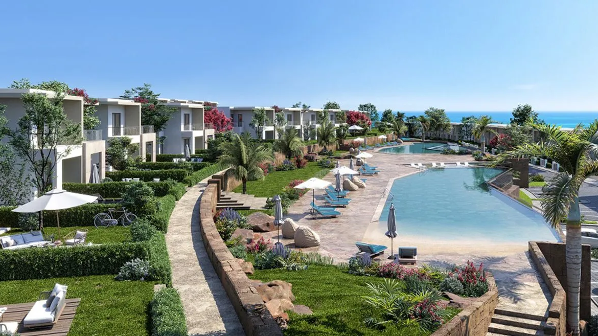 Rendering of a lagoon pool with sun loungers and a curved walkway - chalet in Seashore, North Coast