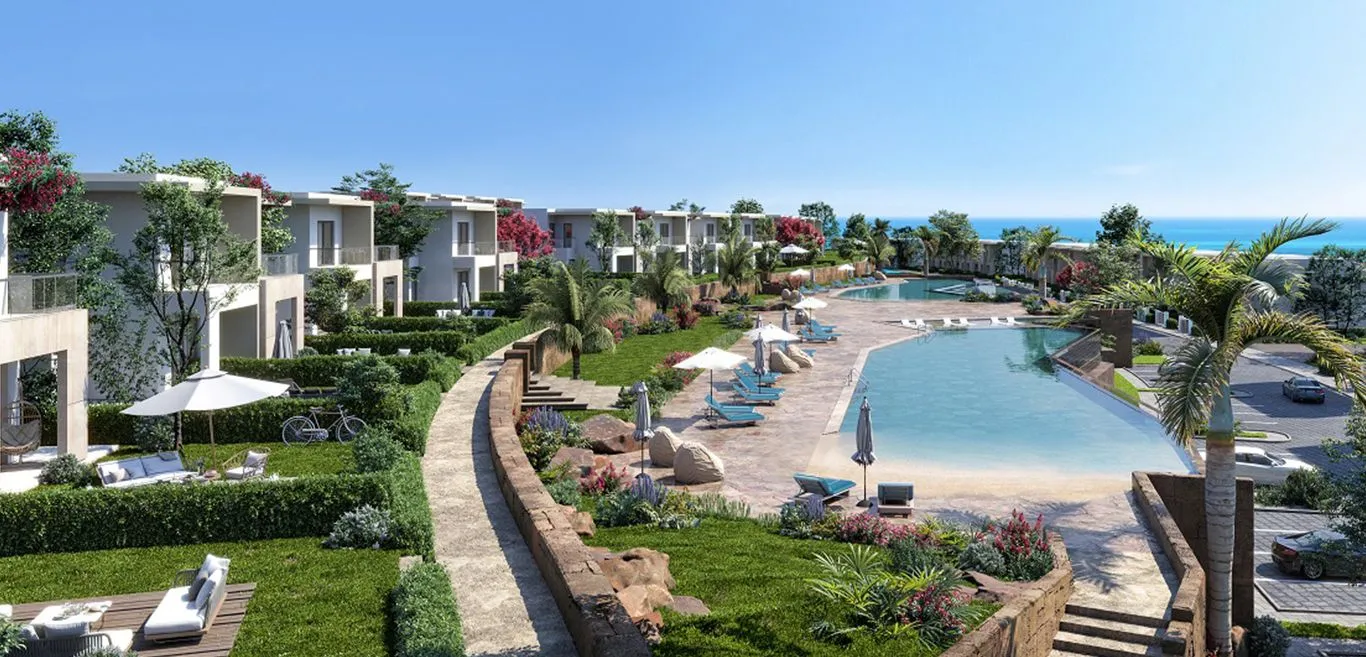 Rendering of a lagoon pool with sun loungers and a curved walkway - chalet in Seashore, North Coast