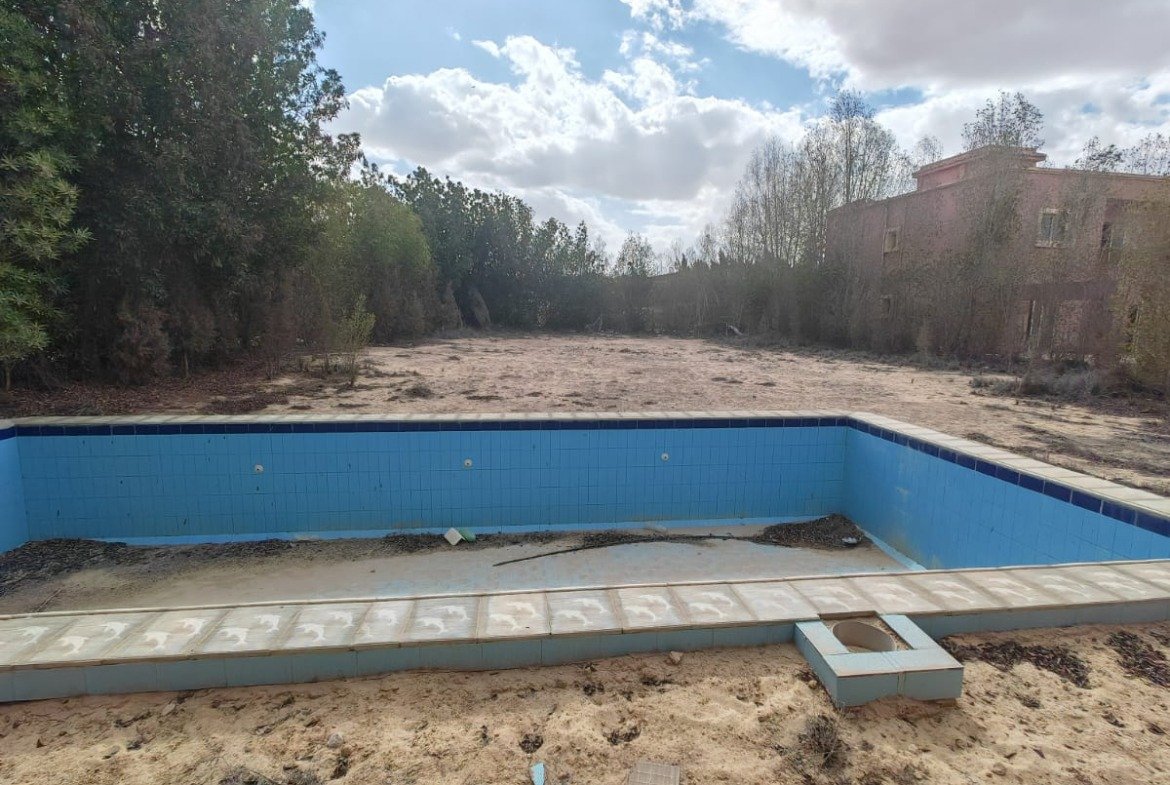 Pool and garden view, villa for sale in Golf Solimaniya, Cairo-Alex Desert Road