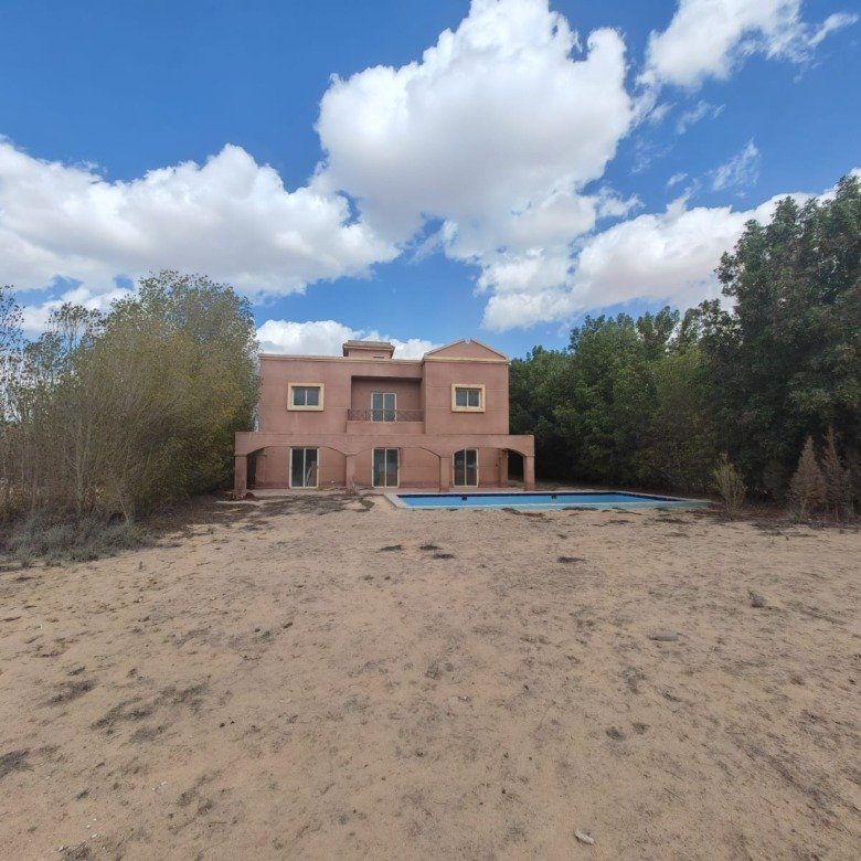 Villa exterior with private swimming pool, villa for sale in Golf Solimaniya, Cairo-Alex Desert Road