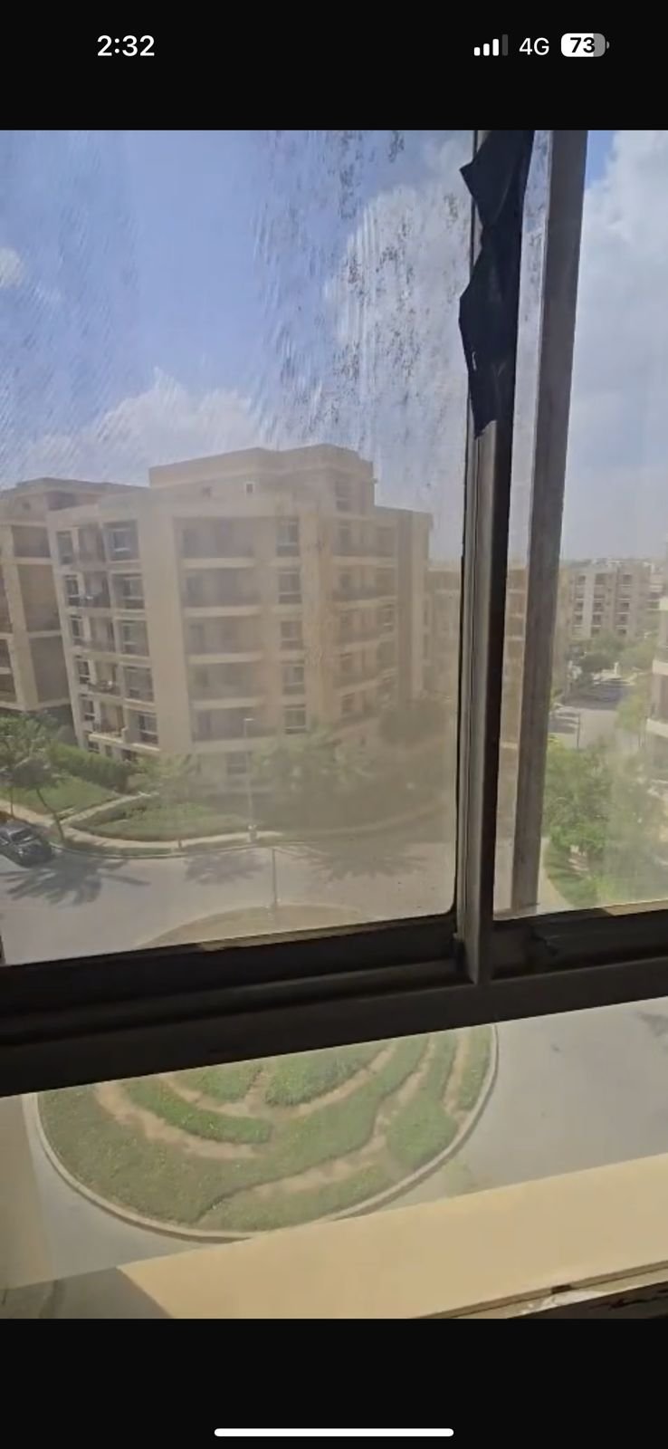 Window view of neighboring apartment buildings - apartment in Taj City, New Cairo