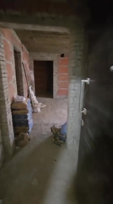 Interior under construction with exposed brick walls - apartment in Taj City, New Cairo