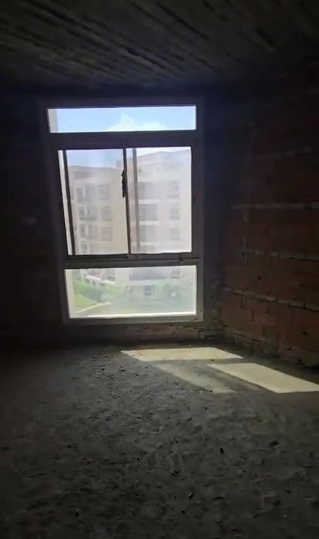 Sunlit unfinished room with a bare cement floor - apartment in Taj City, New Cairo