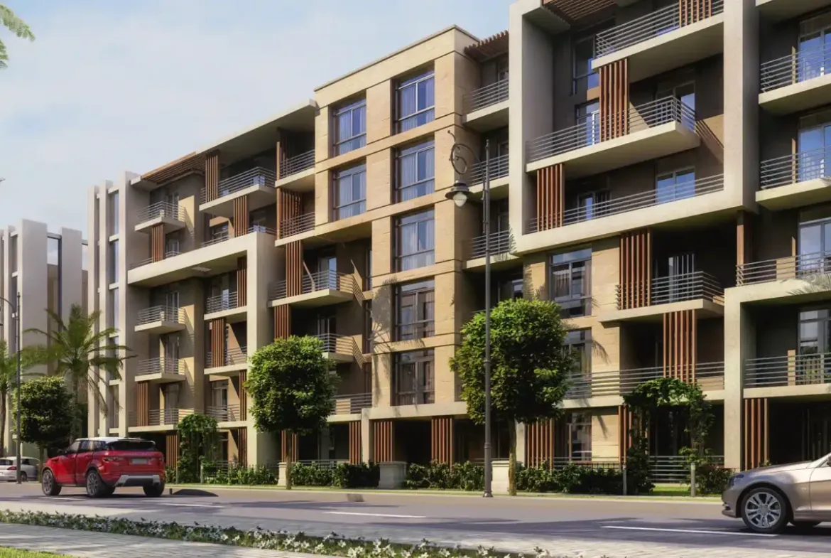 عمارة ببلكونات بني على شارع تصطف عليه النخيل - شقة في شاليا تاج سيتي